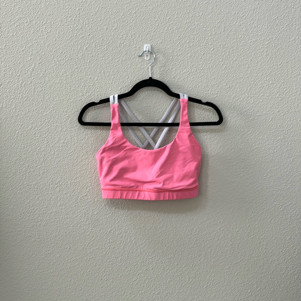 lululemon energy bra in the color guava pink